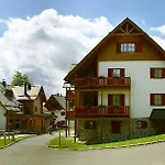 ホテル Pohorje Village Wellbeing - Wellness & Bolfenk 4*